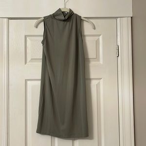Never worn, spandex green dress with small turtleneck type neck. Size Small